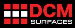 DCM Surfaces logo