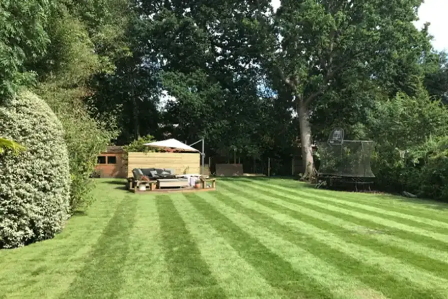 Artificial grass installation by Above & Beyond Landscapes