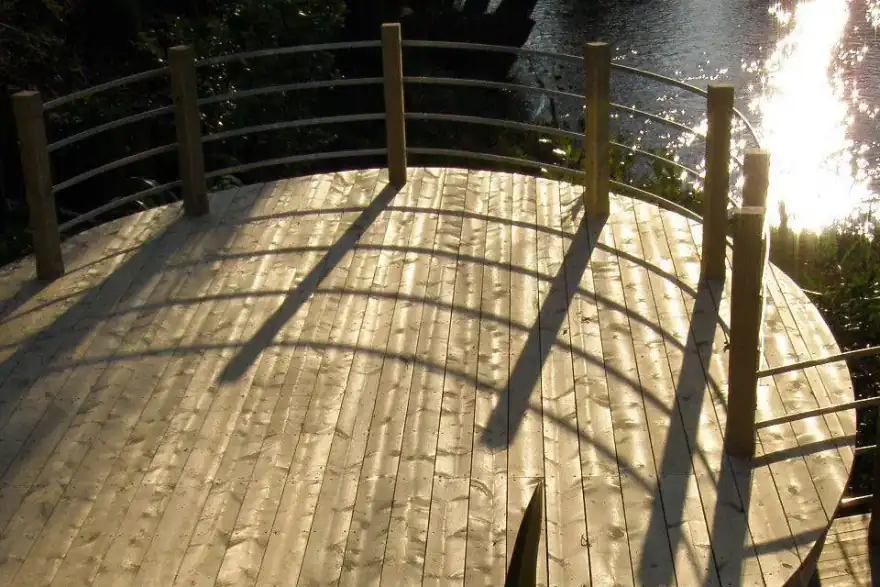 Garden with decking and pond