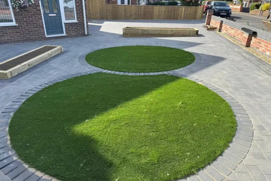 Artificial grass installation by Creative Gardens