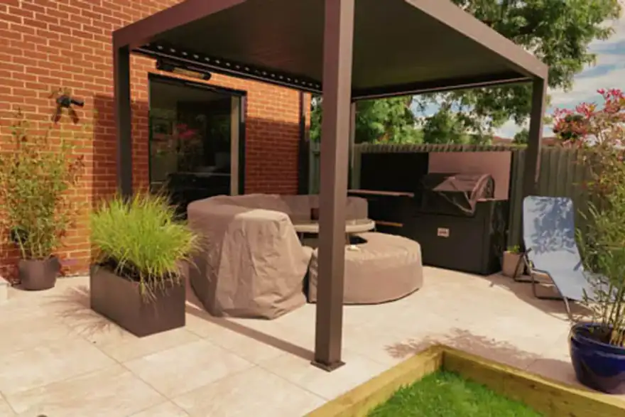 Garden makeover featuring porcelain, composite decking, and Venetian fencing for a stylish outdoor space