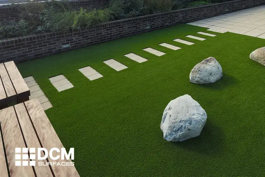 Artificial grass installation by DCM Surfaces