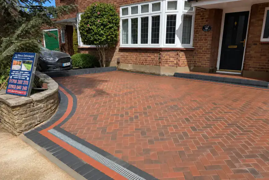 Artificial grass installation by Direct Driveways
