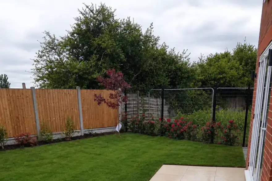 Artificial grass installation by Direct Driveways