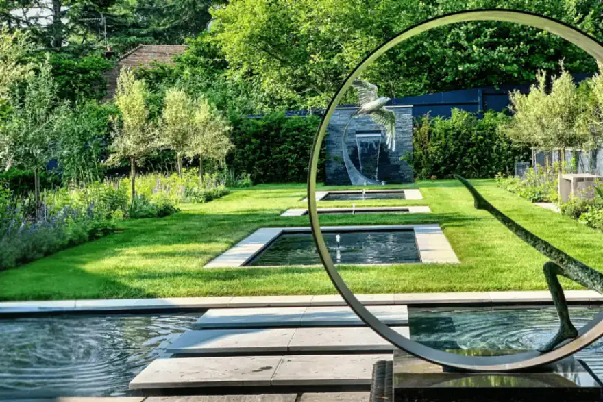 Garden design with water feature fountain by Element Landscapes