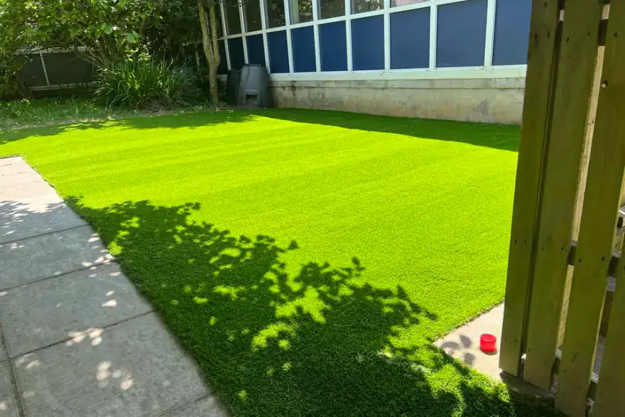 Artificial grass installation by Endurance Surfaces Ltd