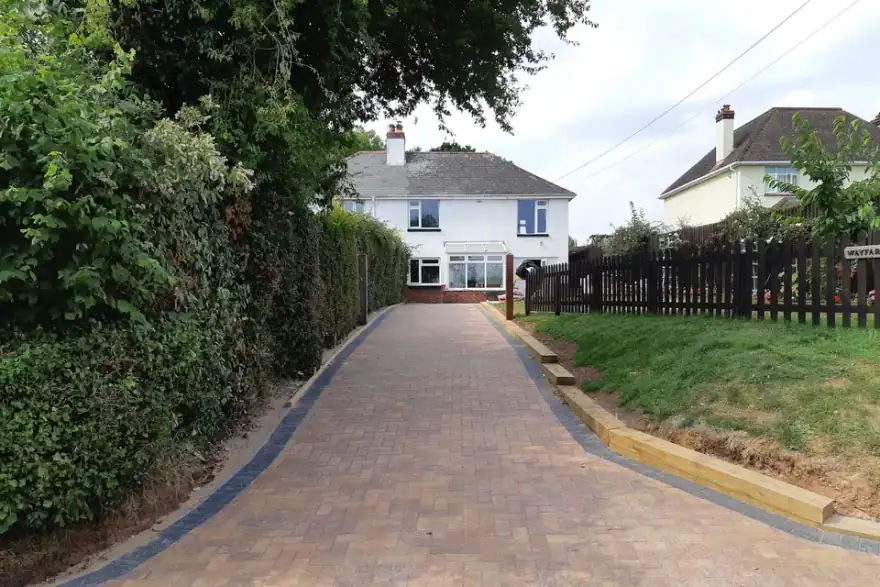 Artificial grass installation by Exe-Terior Landscaping Paving & Patios