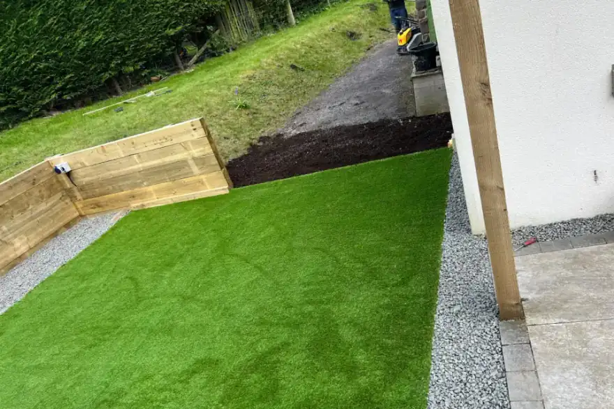 Artificial grass and sleeper raised beds installed in Stirling