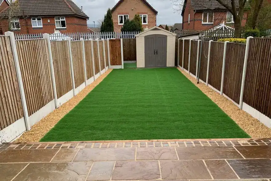 Artificial grass installation by Gandlfencing