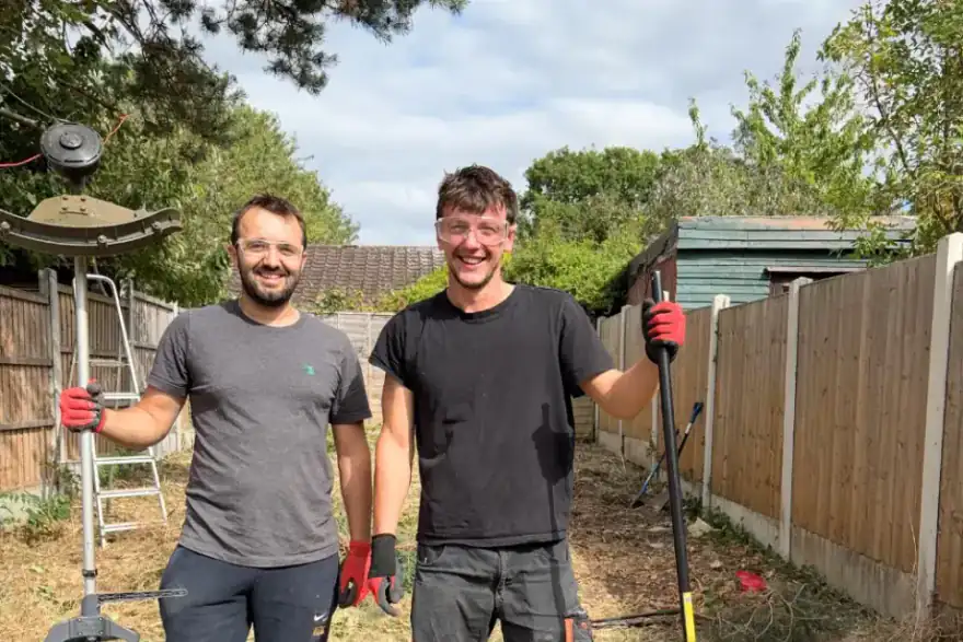2 gardeners with tools