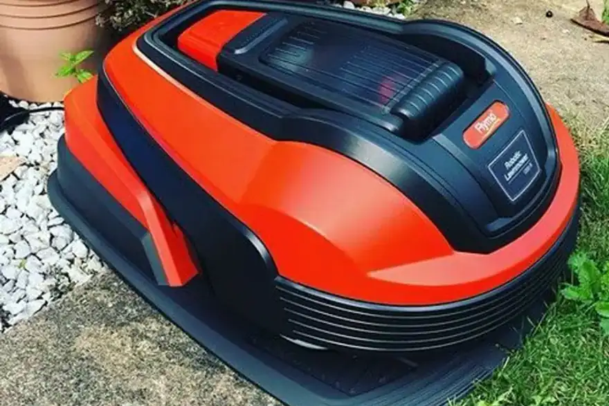 Flymo robotic lawn mower on a garden lawn