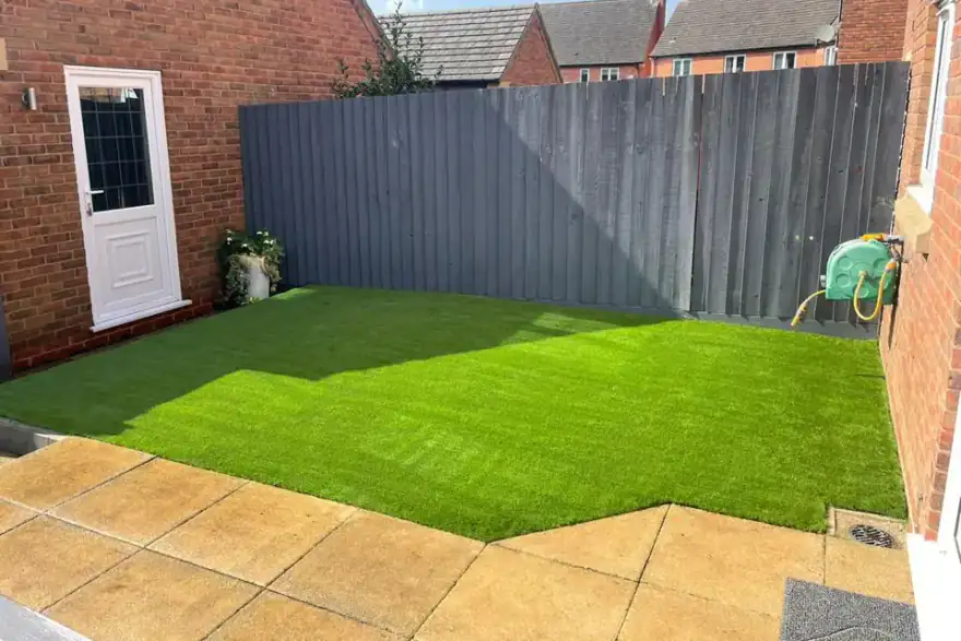 This is a photo of a recently landscaped garden in Leicester. Leicester artificial grass services carried this out