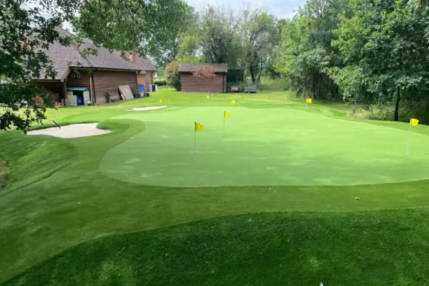 Putting green with fake grass installed in West Sussex with bunkers