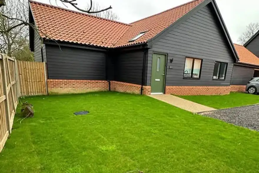 Artificial grass installation by Lux Landscape Gardeners Hertfordshire