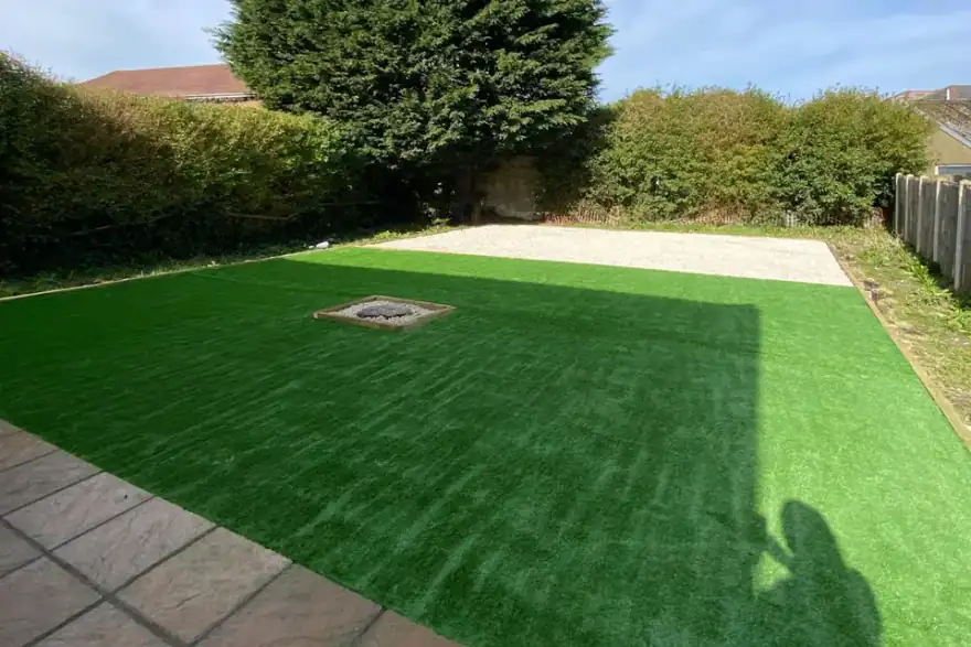 Composite fencing Bournemouth garden with slatted timber-style screens – Marshall Landscapes