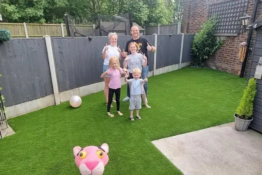 Artificial grass installation by Marston Lawns Ltd