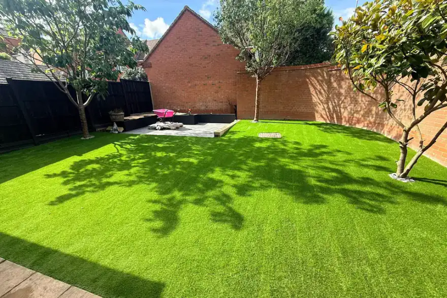 Artificial grass installation by Marston Lawns Ltd