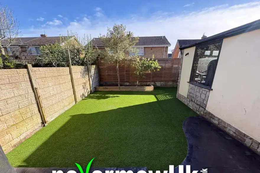 Artificial grass installation by NeverMowUK Ltd
