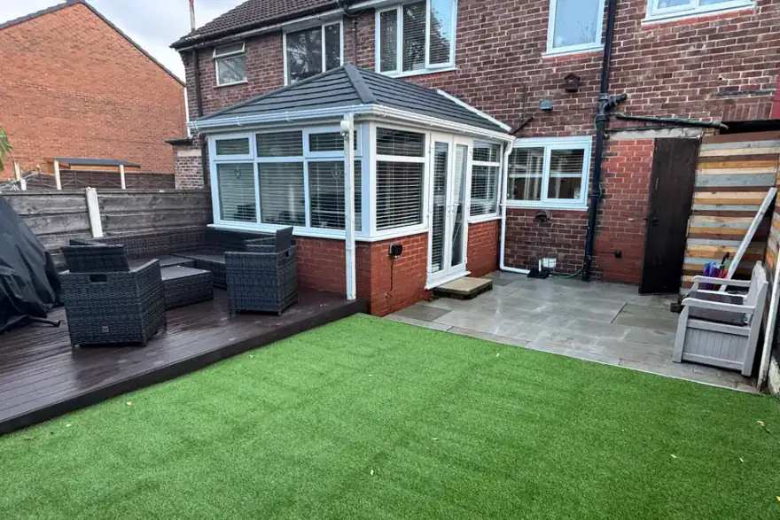 Artificial grass installation by NeverMowUK Ltd