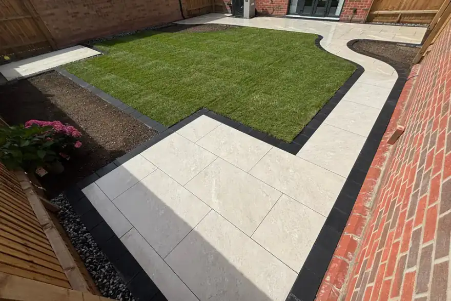 Himalayan Beige Porcelain Patio with Charcoal Border & Fresh Lawn