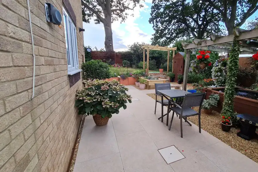 Artificial grass installation by Norfolk Landscapes Ltd