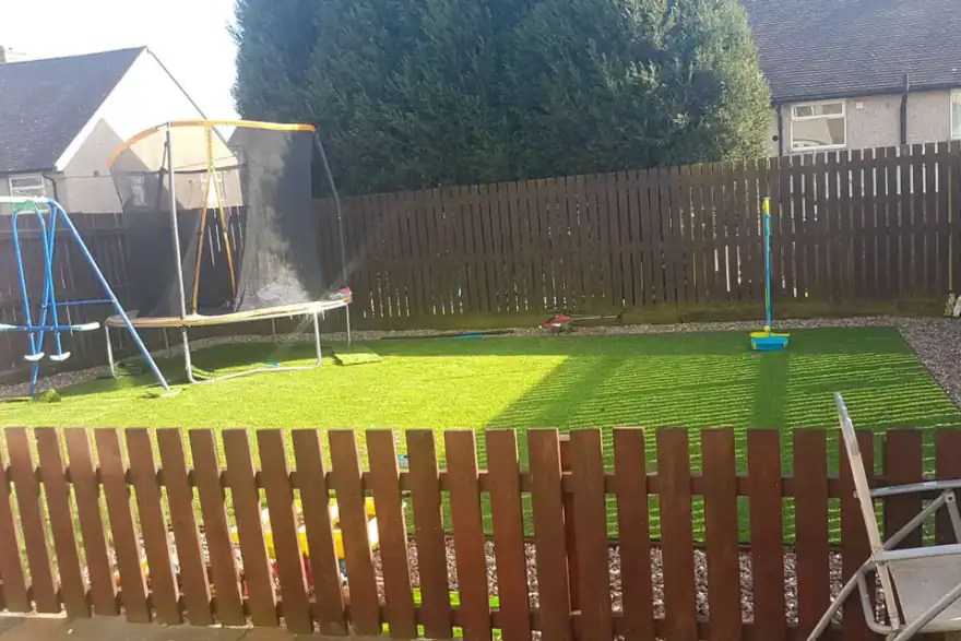 Artificial grass installation by P L Landscape Solutions