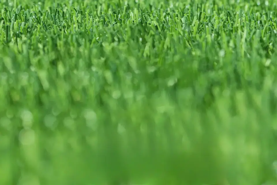 Artificial grass installation by Polytan Sports Surfaces UK