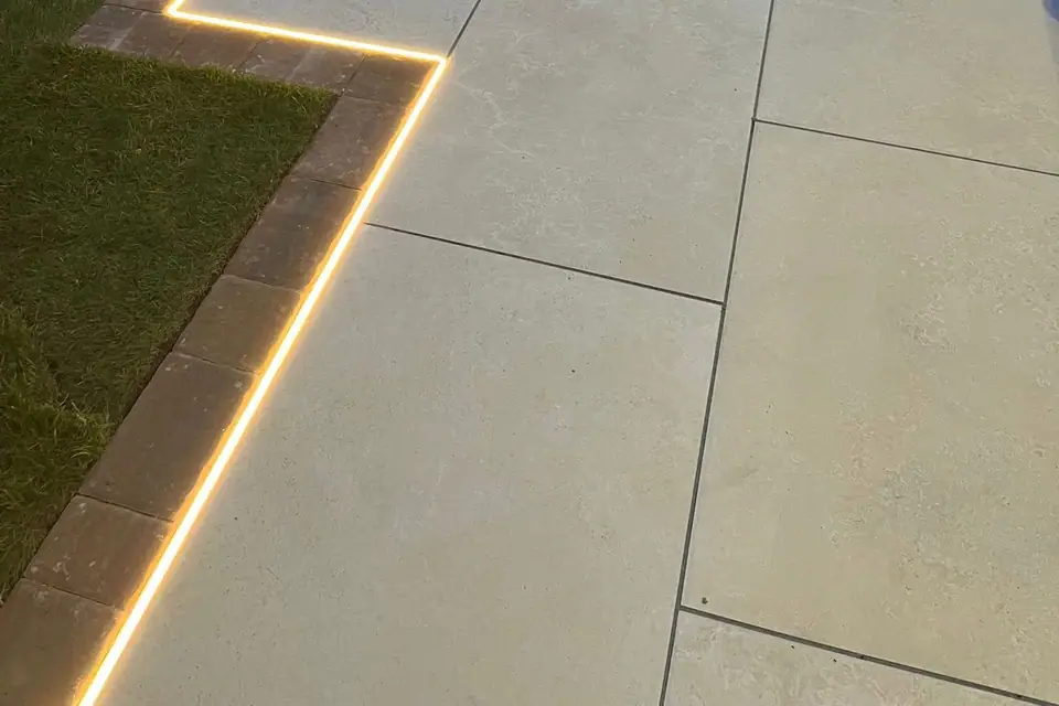 Artificial grass installation by Signature Driveways. Inspired Landscapes.