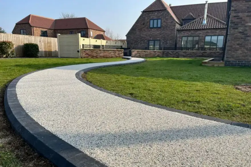 Artificial grass installation by South Cambs Resin Bound