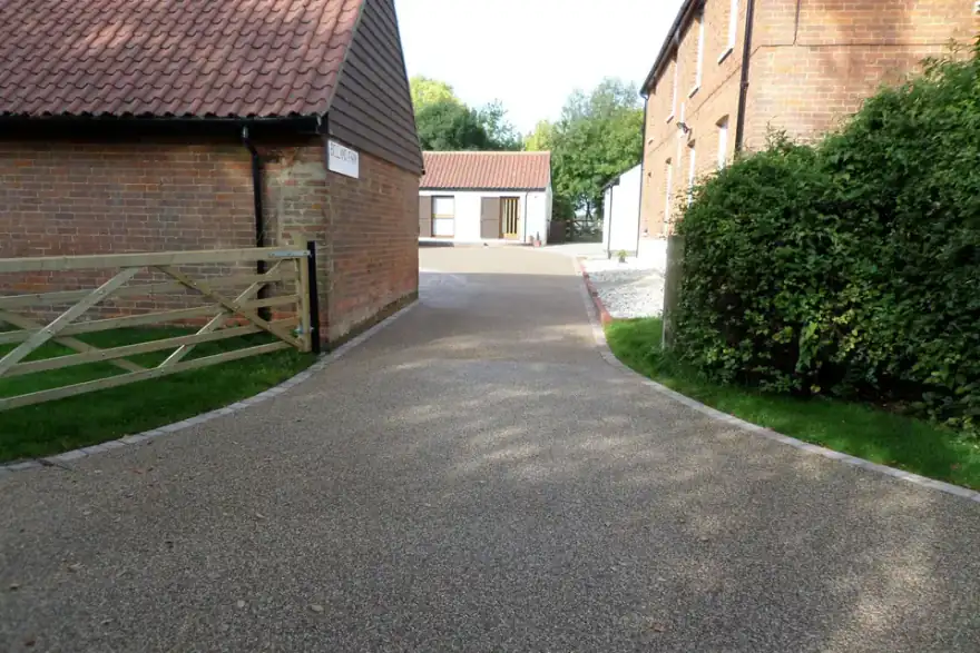 Artificial grass installation by South Cambs Resin Bound