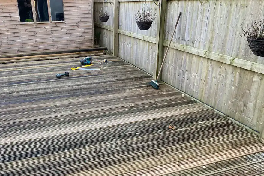 Garden decking and boundary fencing and gate fitted by St Ives Fencing Services