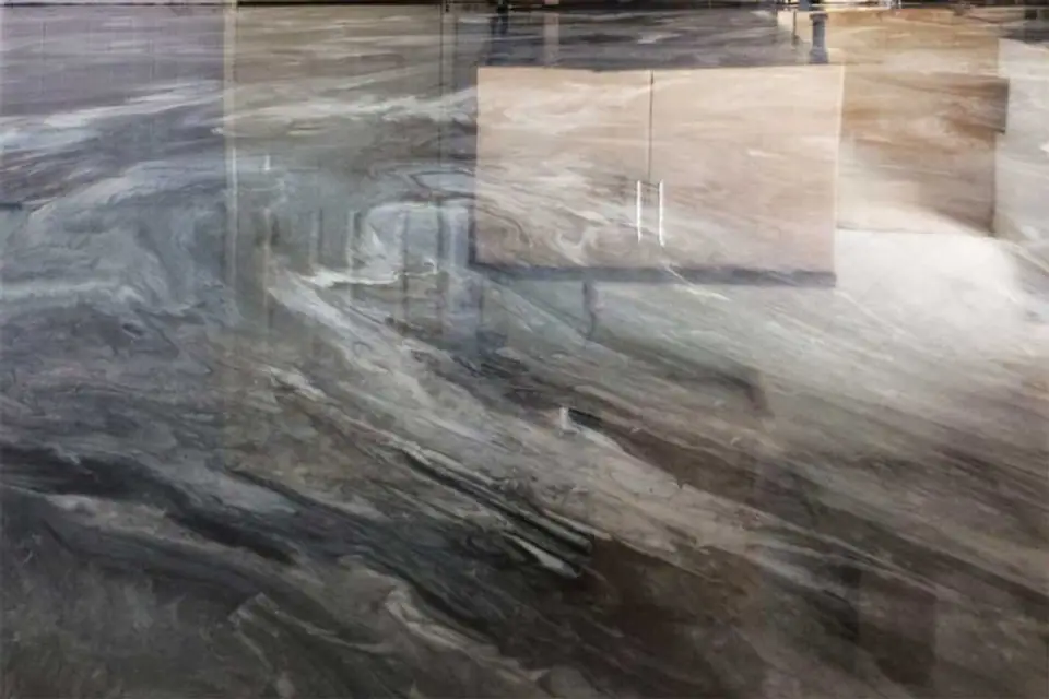 Marble effect metallic epoxy flooring installed in a kitchen in Wrexham b y Supa Resin