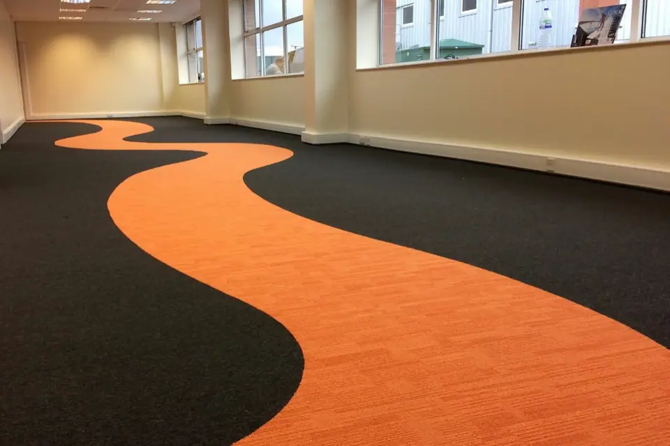 Artificial grass installation by Taylor Made Flooring