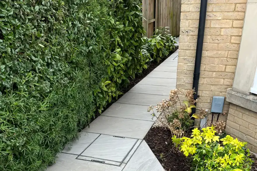 Artificial grass installation by The Landworks