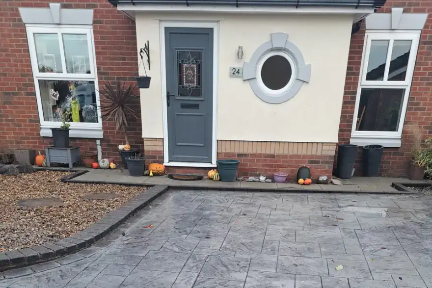 Artificial grass installation by TMF Driveways
