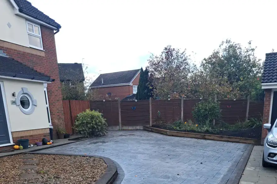 Artificial grass installation by TMF Driveways