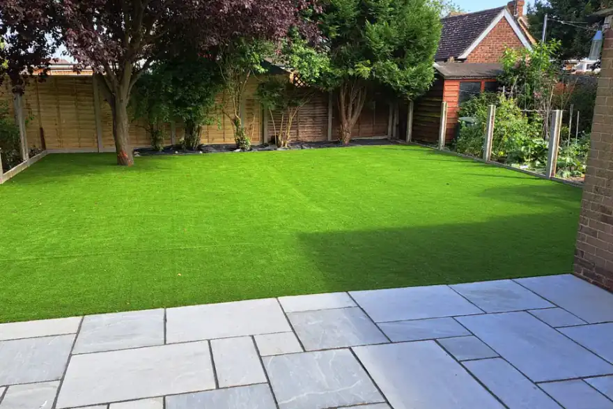 Artificial grass installation by Top Pave Driveways