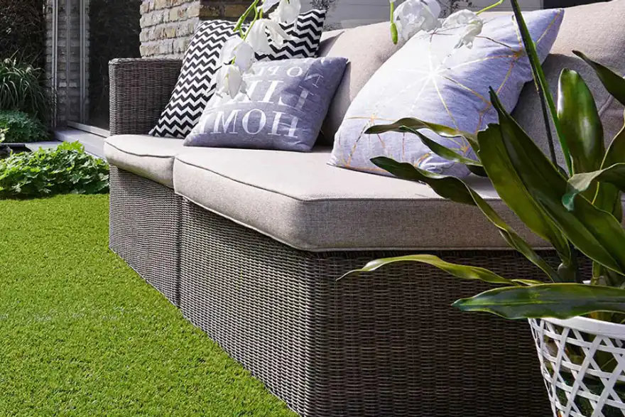 Beautiful garden with artificial grass lawn