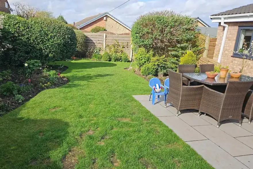 Artificial grass installation by Ultimate Paving
